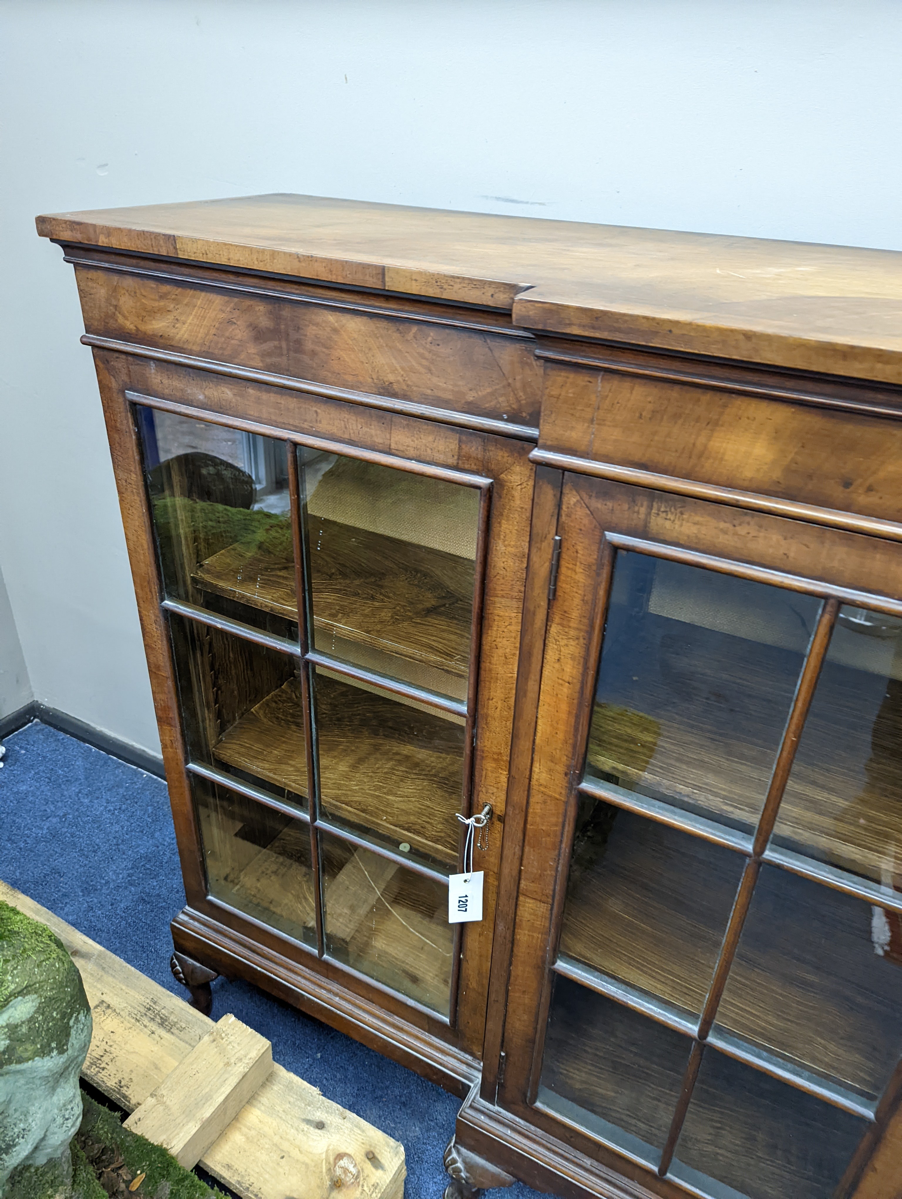 A Queen Anne revival walnut dwarf breakfront bookcase, length 182cm, depth 38cm, height 113cm